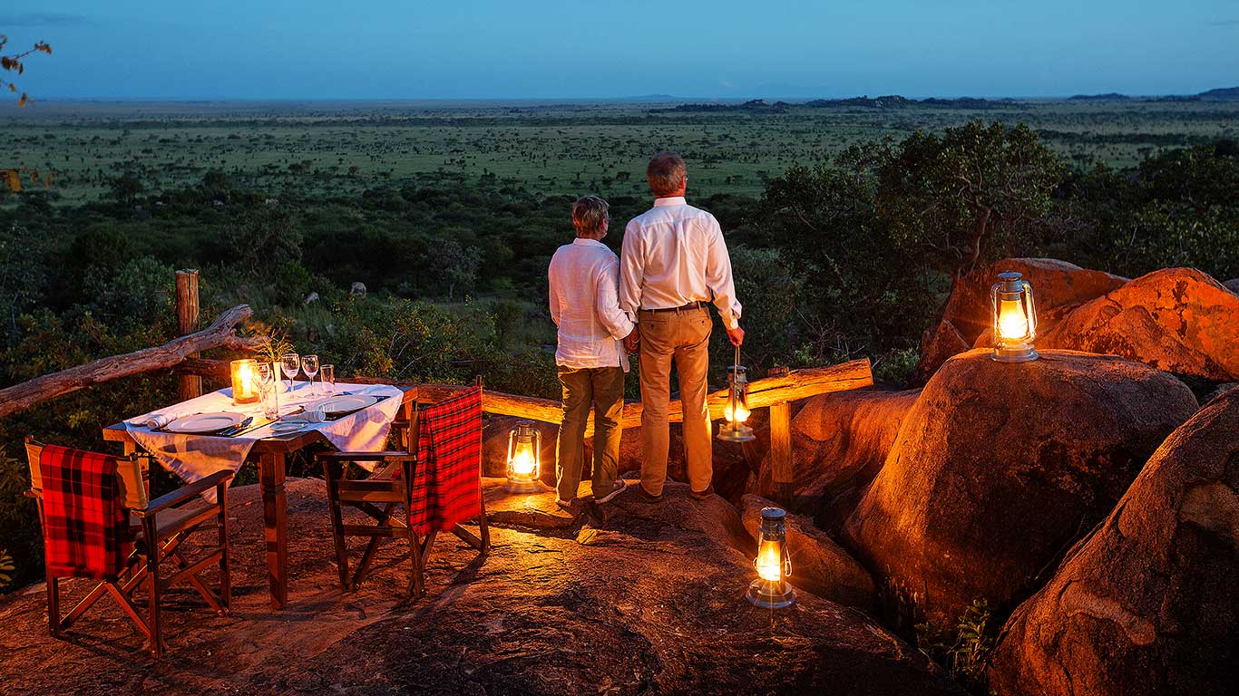 Private sundowner dinner overlooking the Serengeti plains